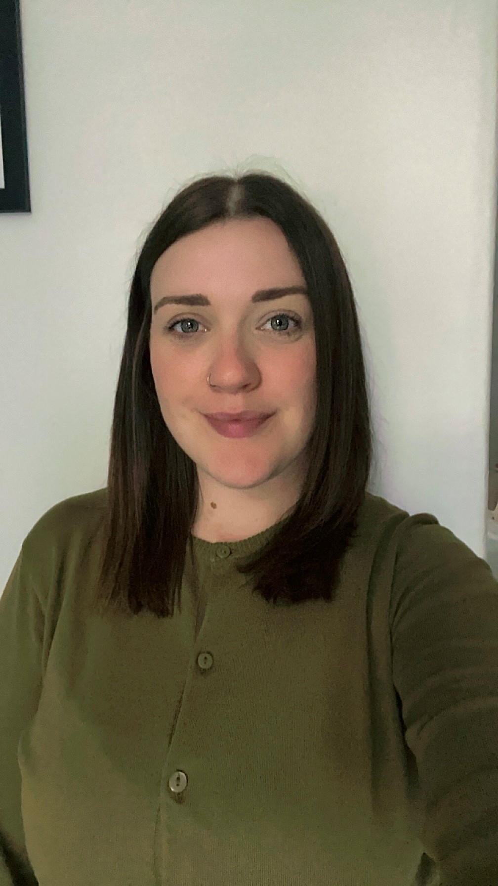 Woman smiling for the camera.