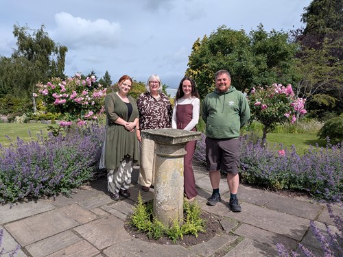 Two smiling horticulture students from SRUC Elmwood campus with their tutor and an organisational representative pose for a photo after returning from their exchange trip to France.